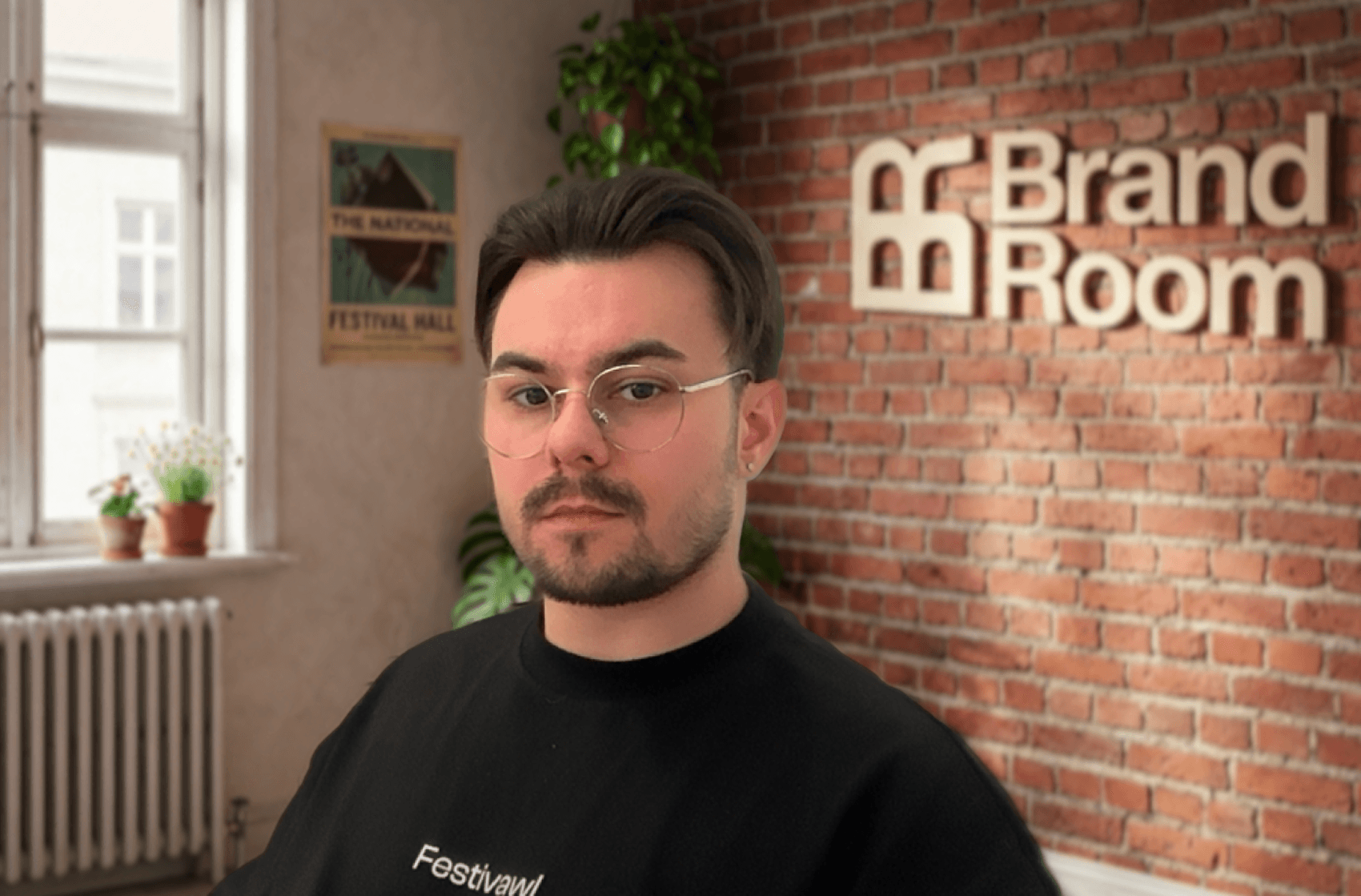 The same person on a branded BrandRoom backdrop